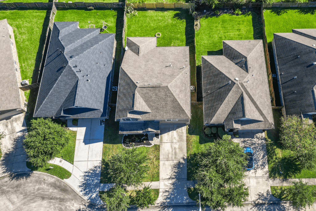 Professional aerial image of a Cypress-area residential property.