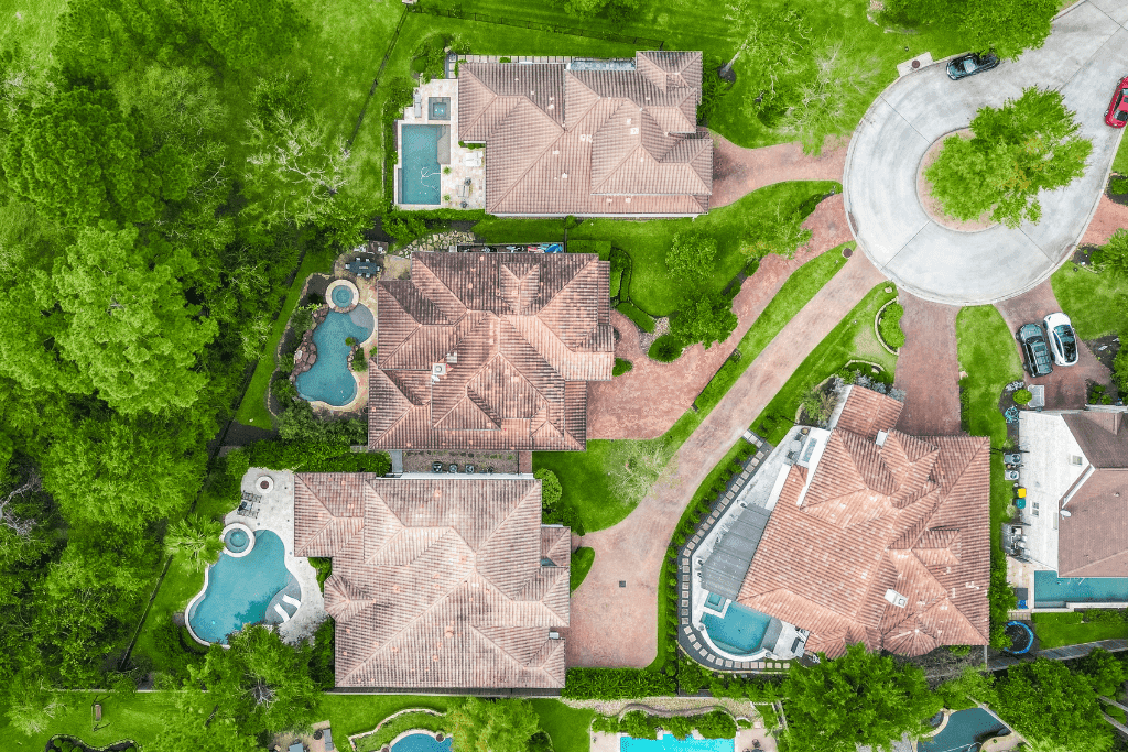 Composed drone photograph highlighting a Cypress real estate listing and outdoor features.