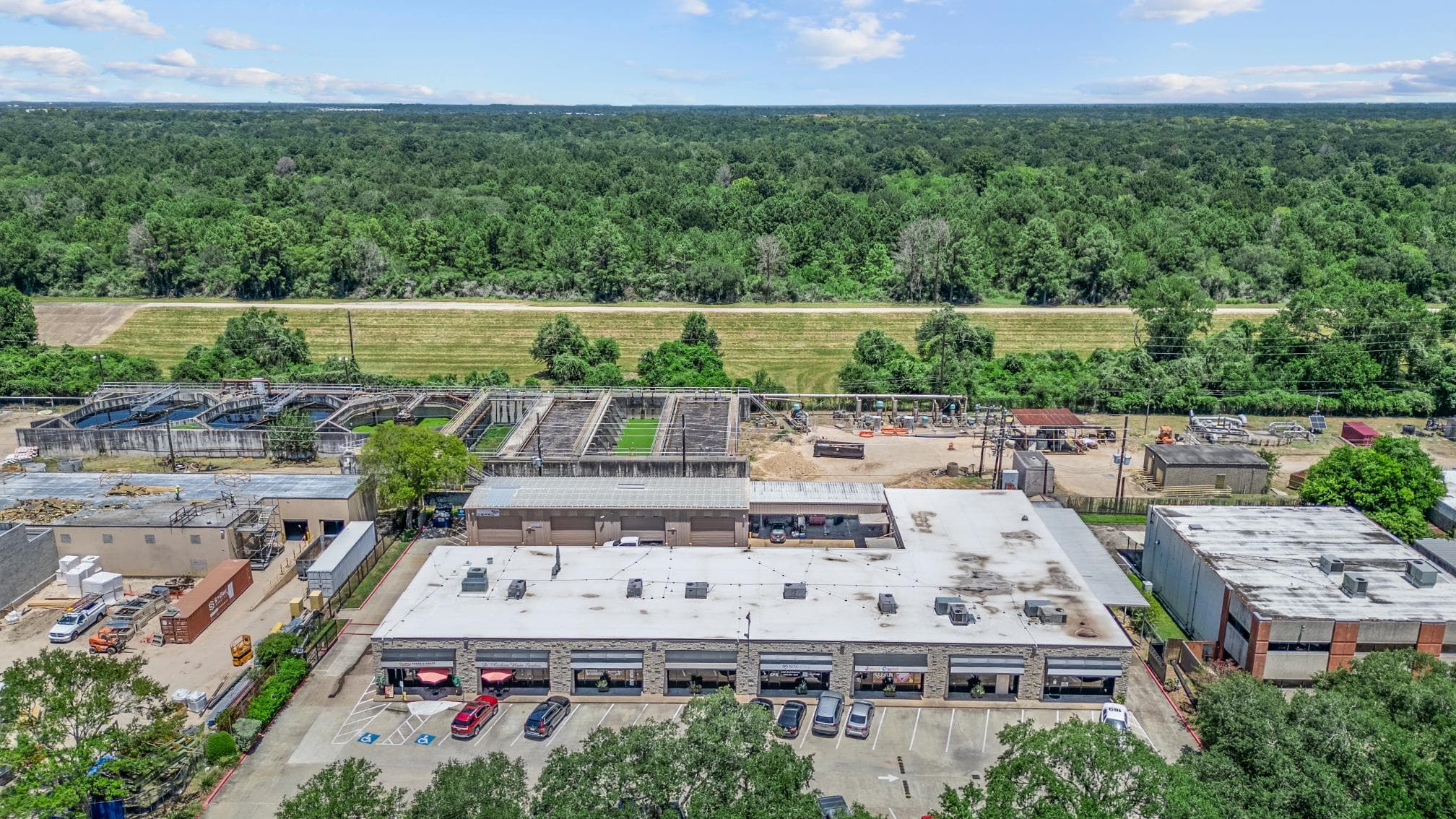 Aerial exterior view showing the full Park Row Boulevard commercial building.