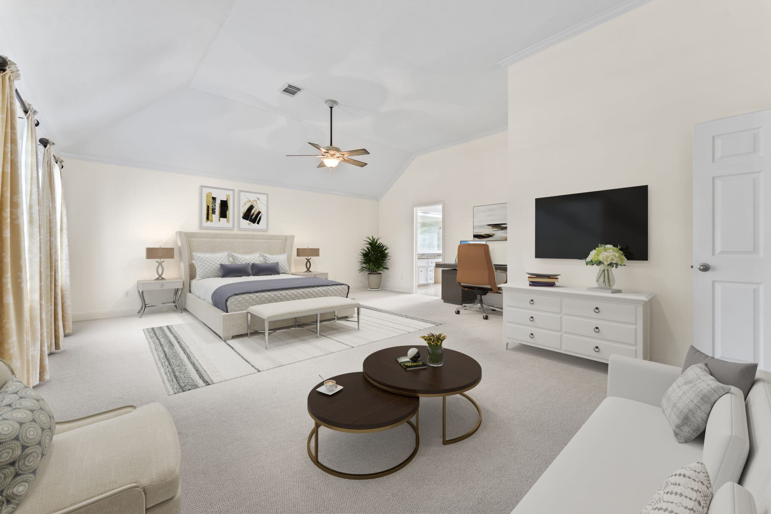 Realistically virtually staged bedroom with sleeping, sitting, and office areas.