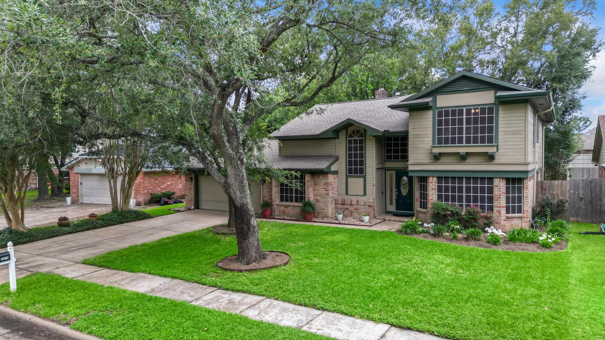 Front exterior real estate photograph of 9915 Gold Cup Way in Houston, Texas.