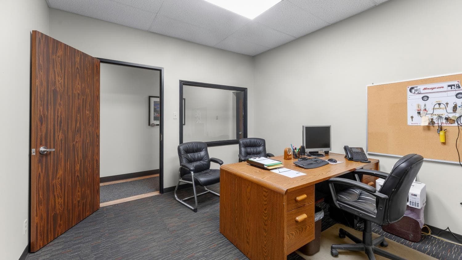 Private office photographed at 16522 Park Row Blvd in Houston.