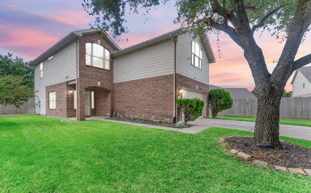 Rear and side exterior view of 20527 Rustic Rail Ct in Cypress.